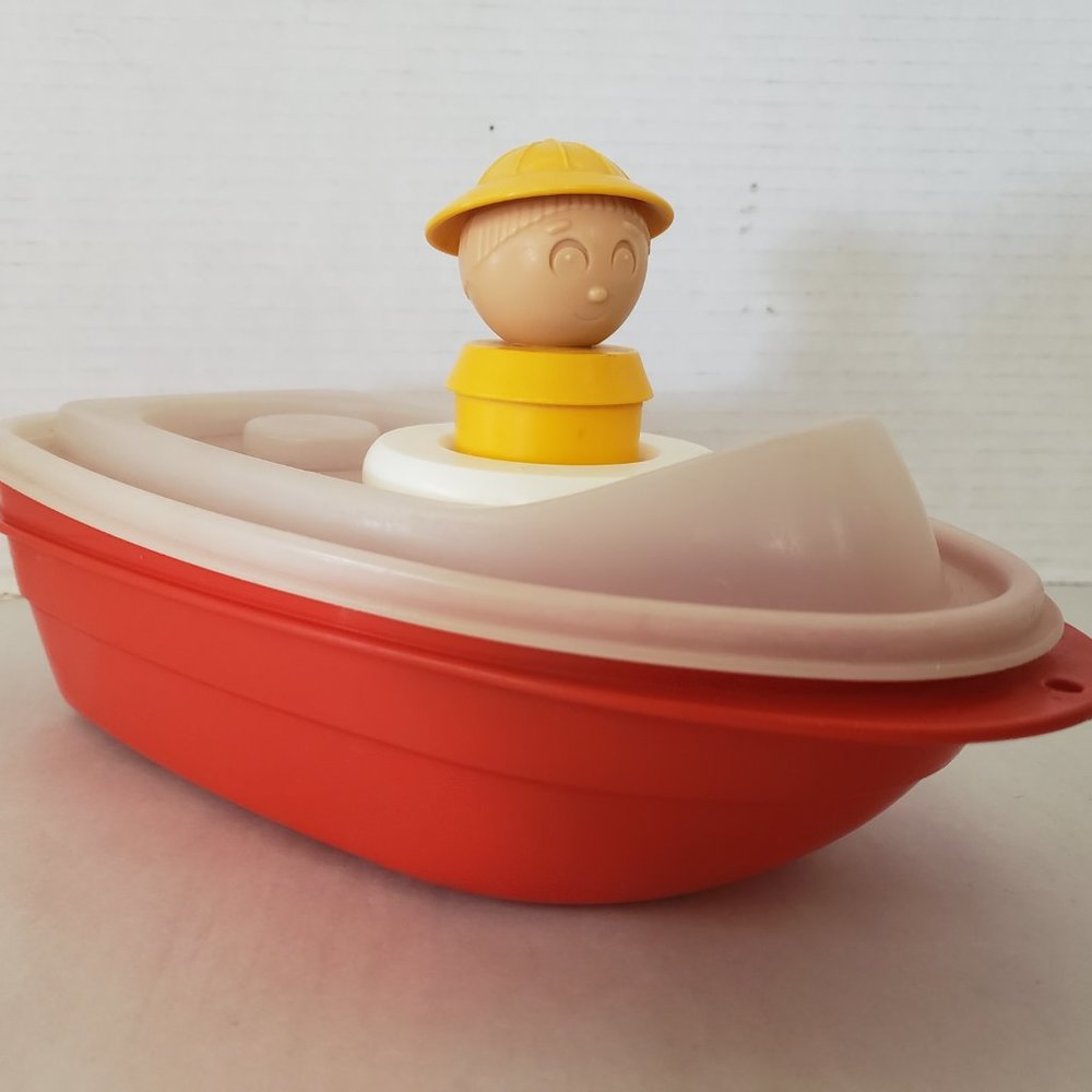 Vintage Tupperware Tugboat Boat and Captain sailor Toy Great shape